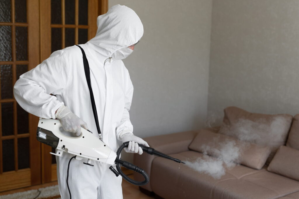 virologist-in-protective-hazmat-suit-conducts