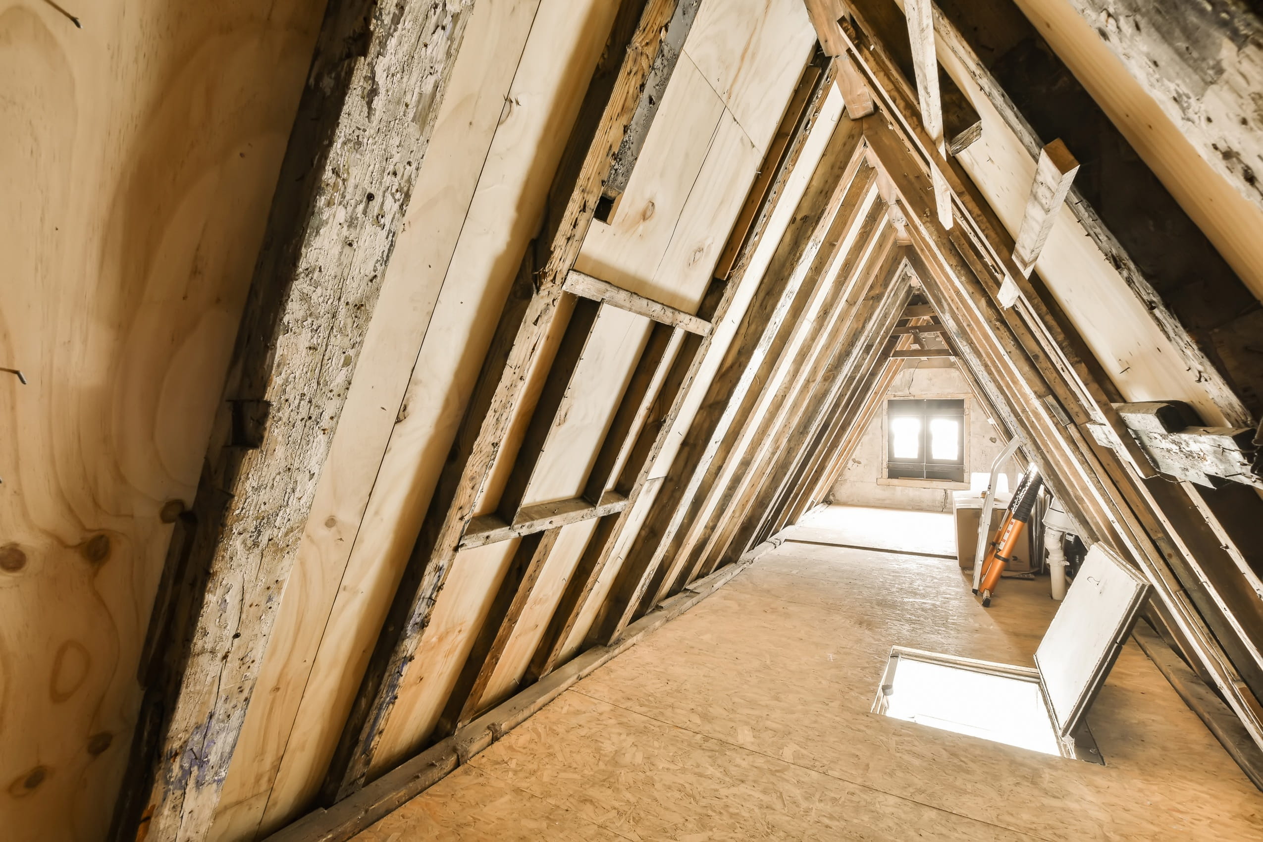 wooden-attic-interior-with-window-light
